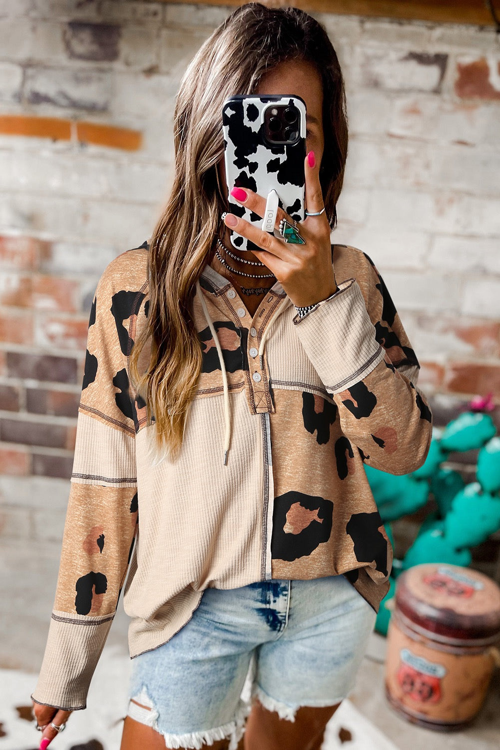 Leopard exposed seam long sleeve top