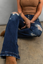 Load image into Gallery viewer, Dark wash distressed flare bottom jeans
