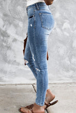 Load image into Gallery viewer, Sky blue high rise distressed button up jeans
