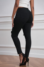 Load image into Gallery viewer, Black distressed high waisted skinny jeans
