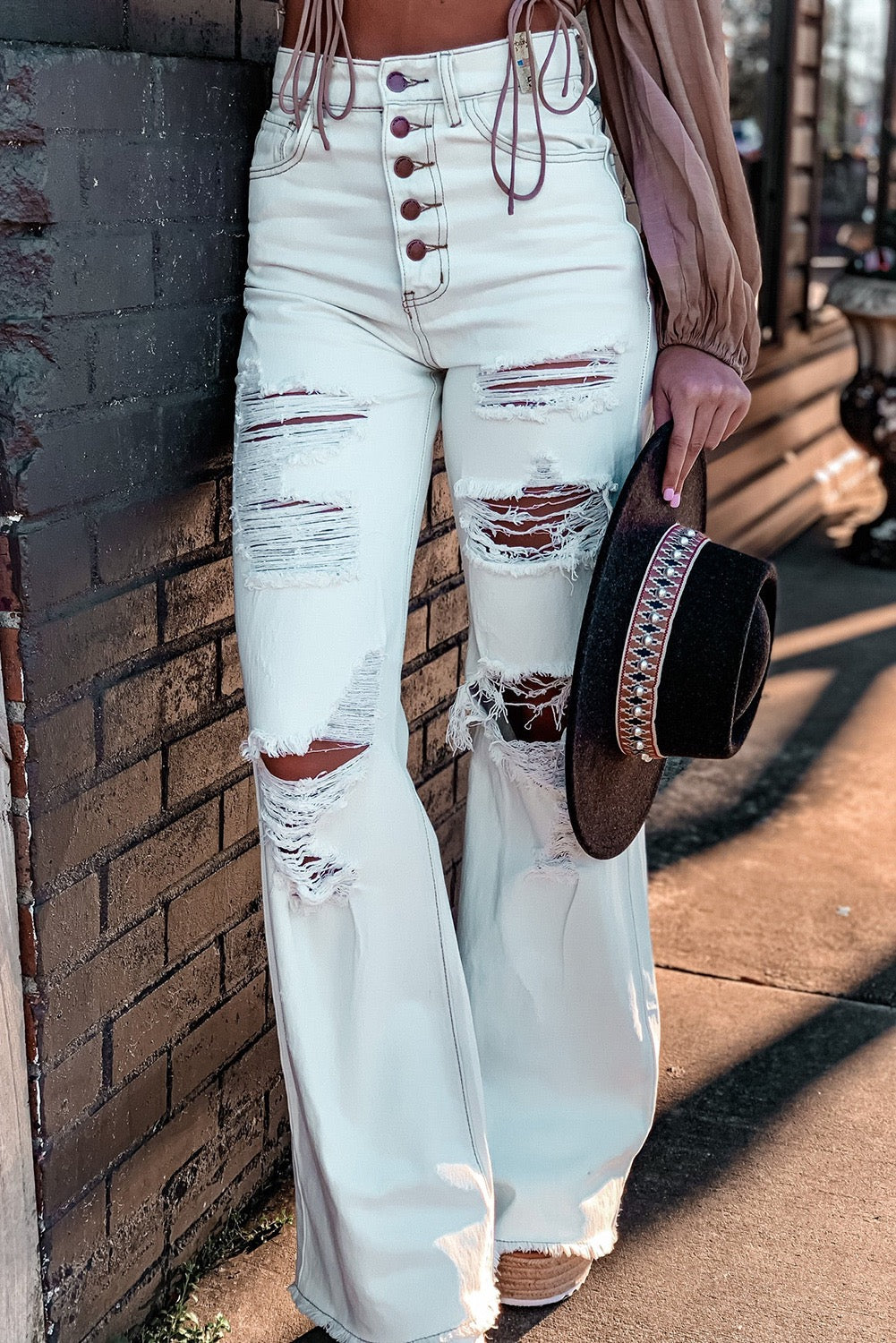 White washed distressed high waisted button up jeans