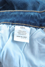 Load image into Gallery viewer, Medium wash high rise flare jeans
