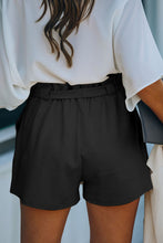 Load image into Gallery viewer, Black cotton blend pocketed knit shorts
